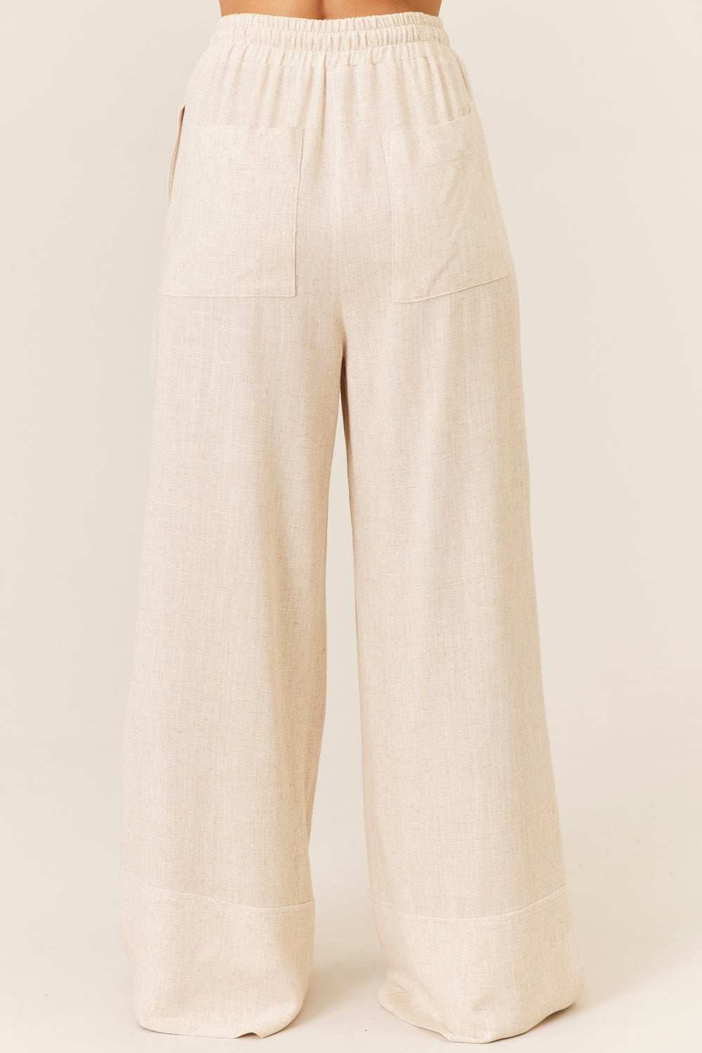 Calça Pantalona De Viscolinho Com Bolsos Bege Yacamim T7