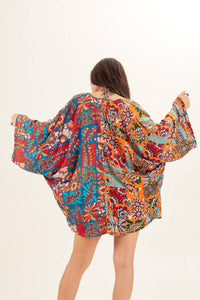 Kimono Curto Com Mangas Longas Estampado Yacamim<br />
<p>
</p>