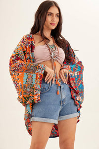 Kimono Curto Com Mangas Longas Estampado Yacamim<br />
<p>
</p>