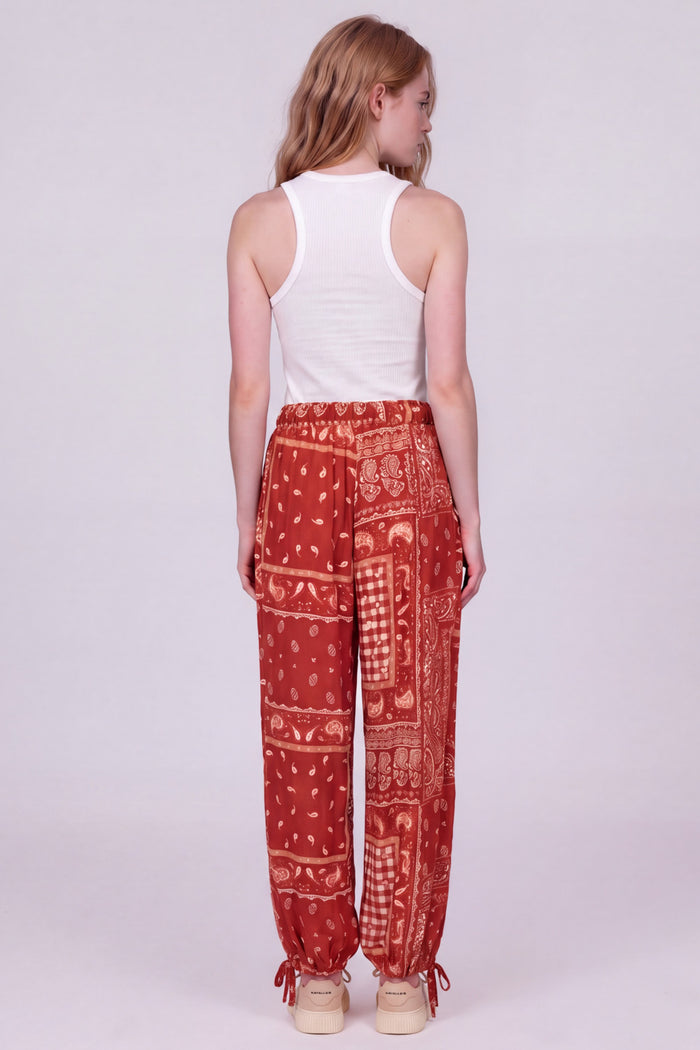 Calça Com Cordões De Regulagem Laranja Escuro Estampado Yacamim T10
