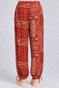 Calça Com Cordões De Regulagem Laranja Escuro Estampado Yacamim T10
