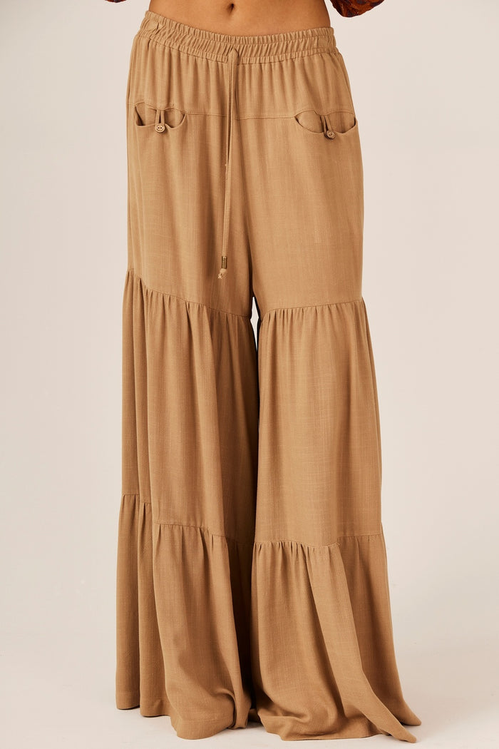 Calça Pantalona Com Franzidos Bege Escuro Yacamim G7