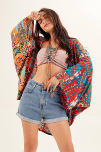 Kimono Curto Com Mangas Longas Estampado Yacamim<br />
<p>
</p>