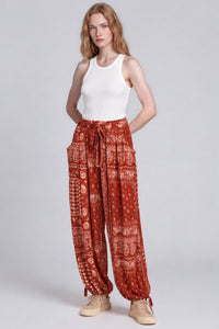 Calça Com Cordões De Regulagem Laranja Escuro Estampado Yacamim T10